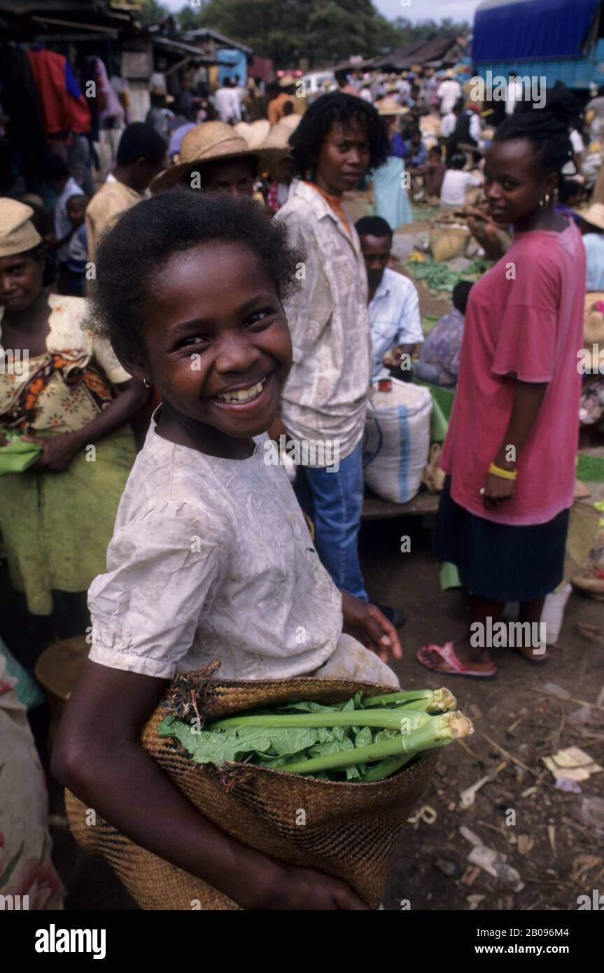 A local girl at the local farmers market in Mananjary in eastern Madagascar Stock Photo