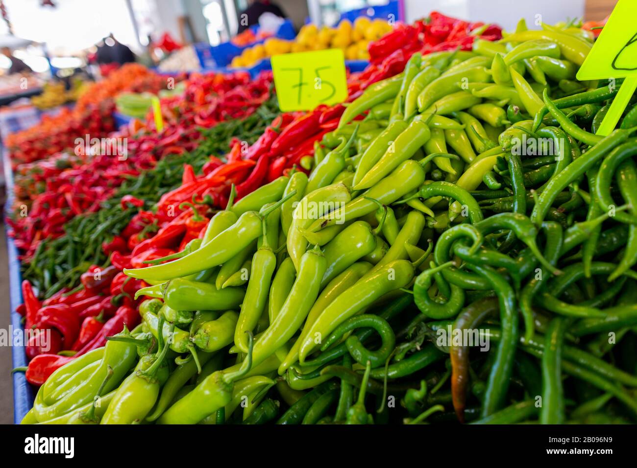 Delicious green and red peppers lies on a market Stock Photo Alamy