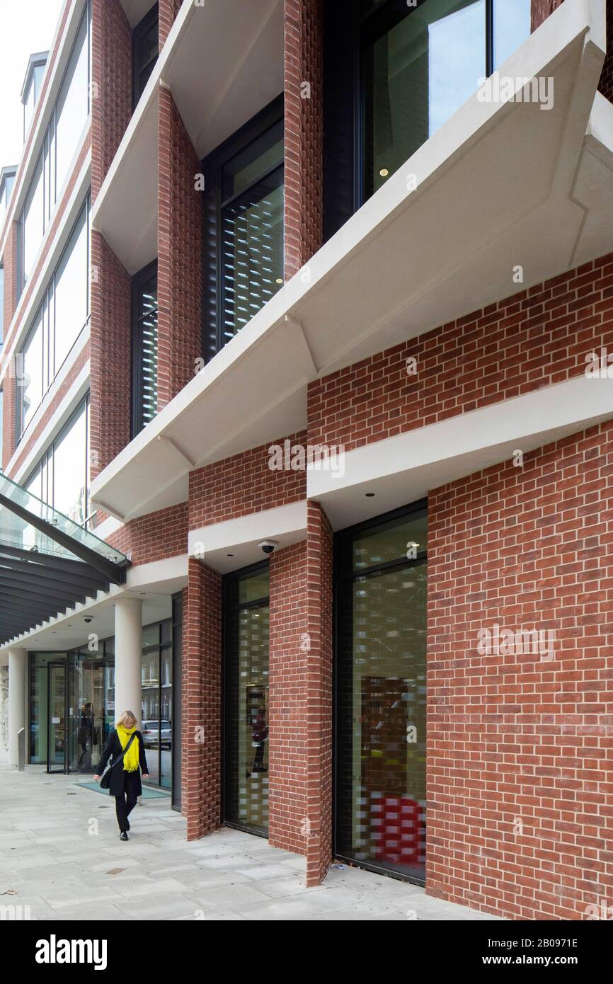 Ground floor detail of front elevation. UCLH Eye Hospital, London, United Kingdom. Architect: pilbrow and partners, 2019. Stock Photo