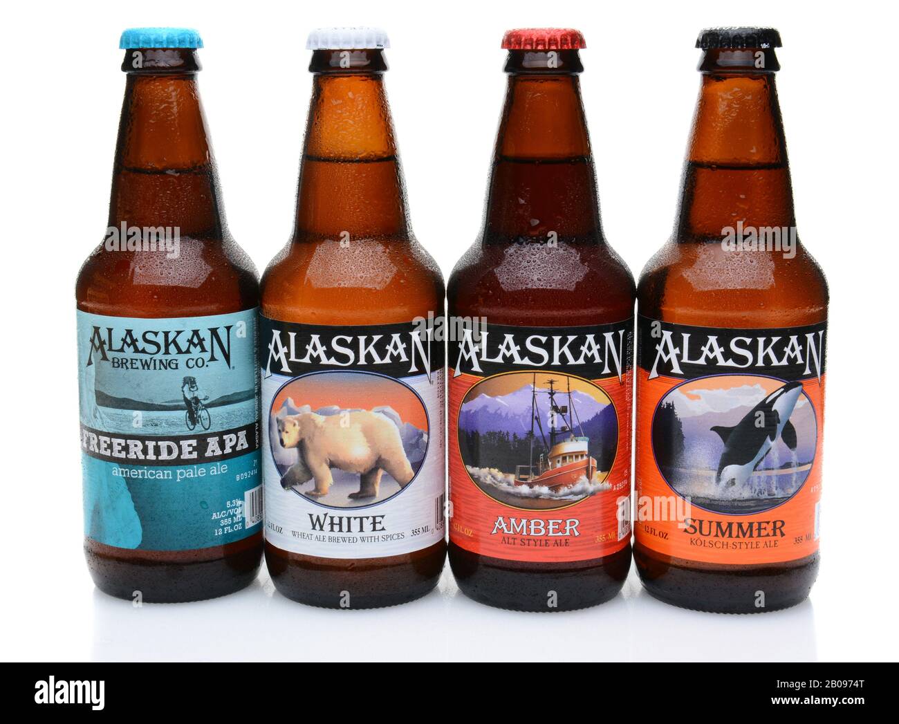 IRVINE, CALIFORNIA - JULY 16, 2014: Four bottles of Alaskan Brewing Co. beers. Alaskan Brewing, founded in 1986 in Juneau, Alaska, was the first Junea Stock Photo