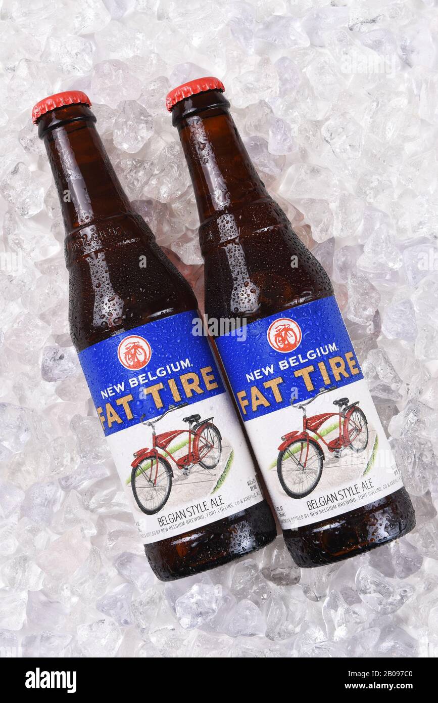 IRVINE, CALIFORNIA - December 14, 2017: Fat Tire Amber Ale bottles on ice. From the New Belgium Brewing Company, of Fort Collins, Colorado. Stock Photo