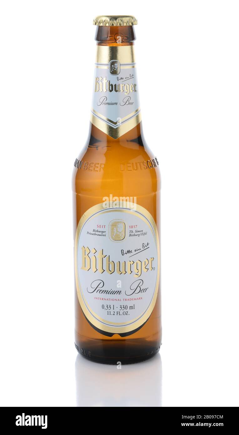 IRVINE, CA - JANUARY 11, 2015: A bottle of Bitburger Beer isolated on white. Bitburger is a German family business with around  that in 2012 produced Stock Photo