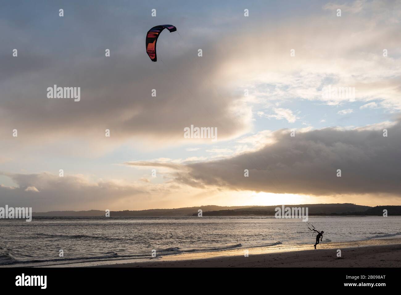 Kite Surfers on the Beach at Exmouth Stock Photo
