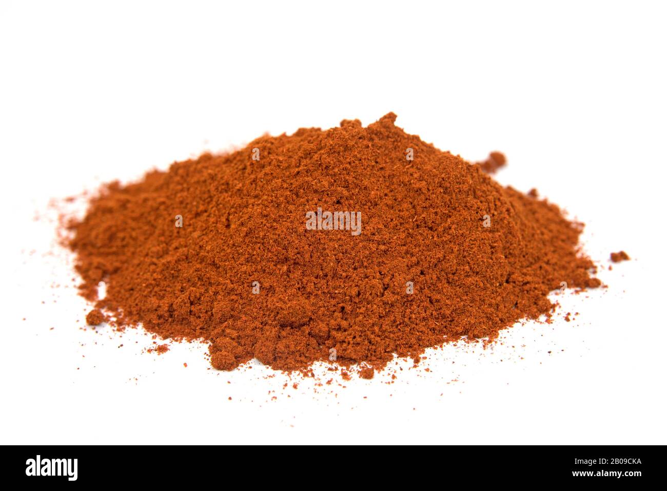 Dried pepperoni powder against white background Stock Photo Alamy