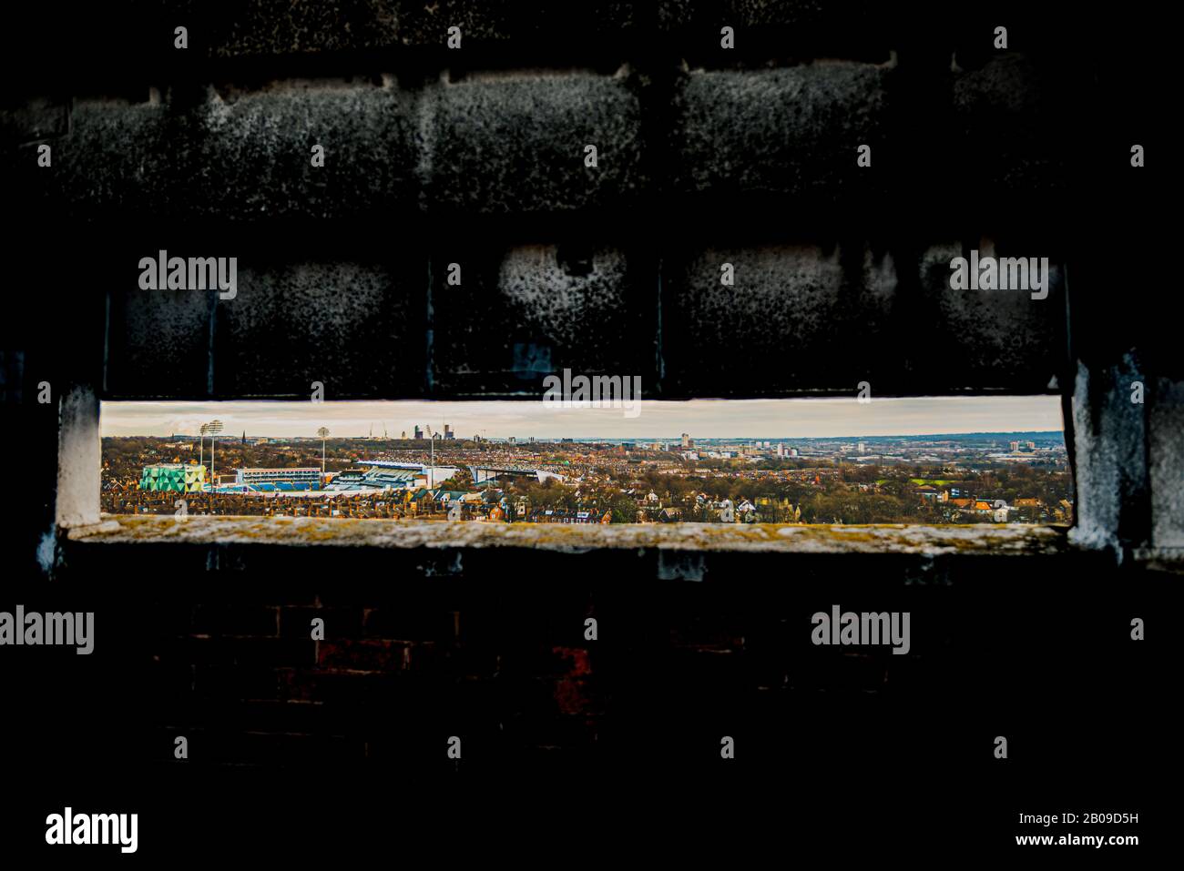 Framed cityscape of Headingley and Leeds City Centre through a parapet wall Stock Photo