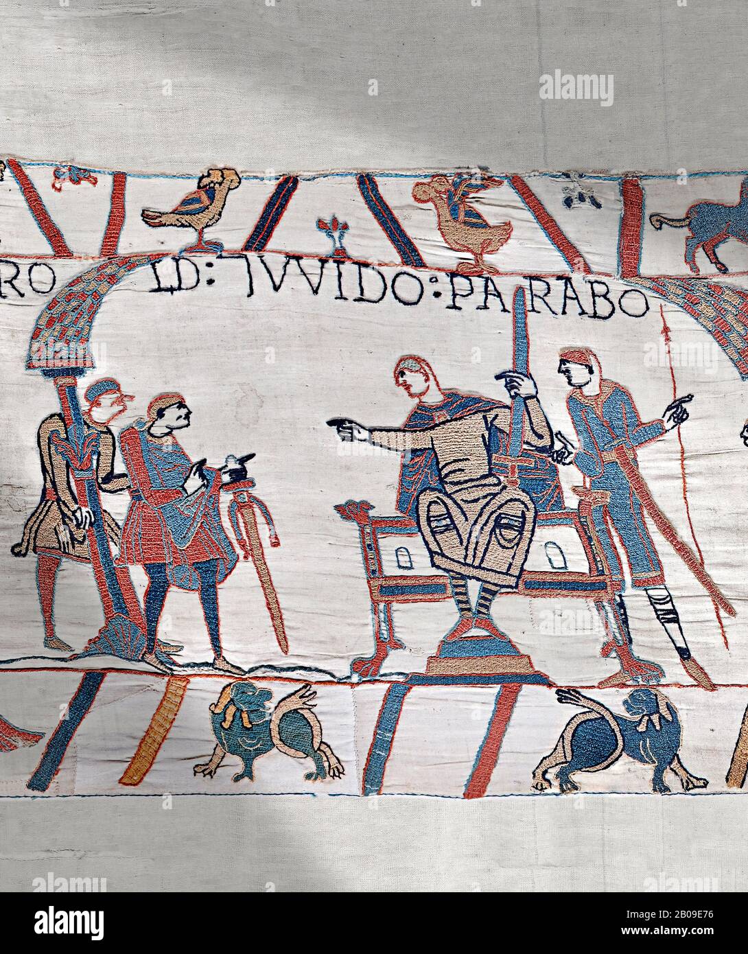 Bayeux Tapestry scene 9:  Guy de Ponthieu, on throne, discussed his with Harold his ransom demands. Stock Photo
