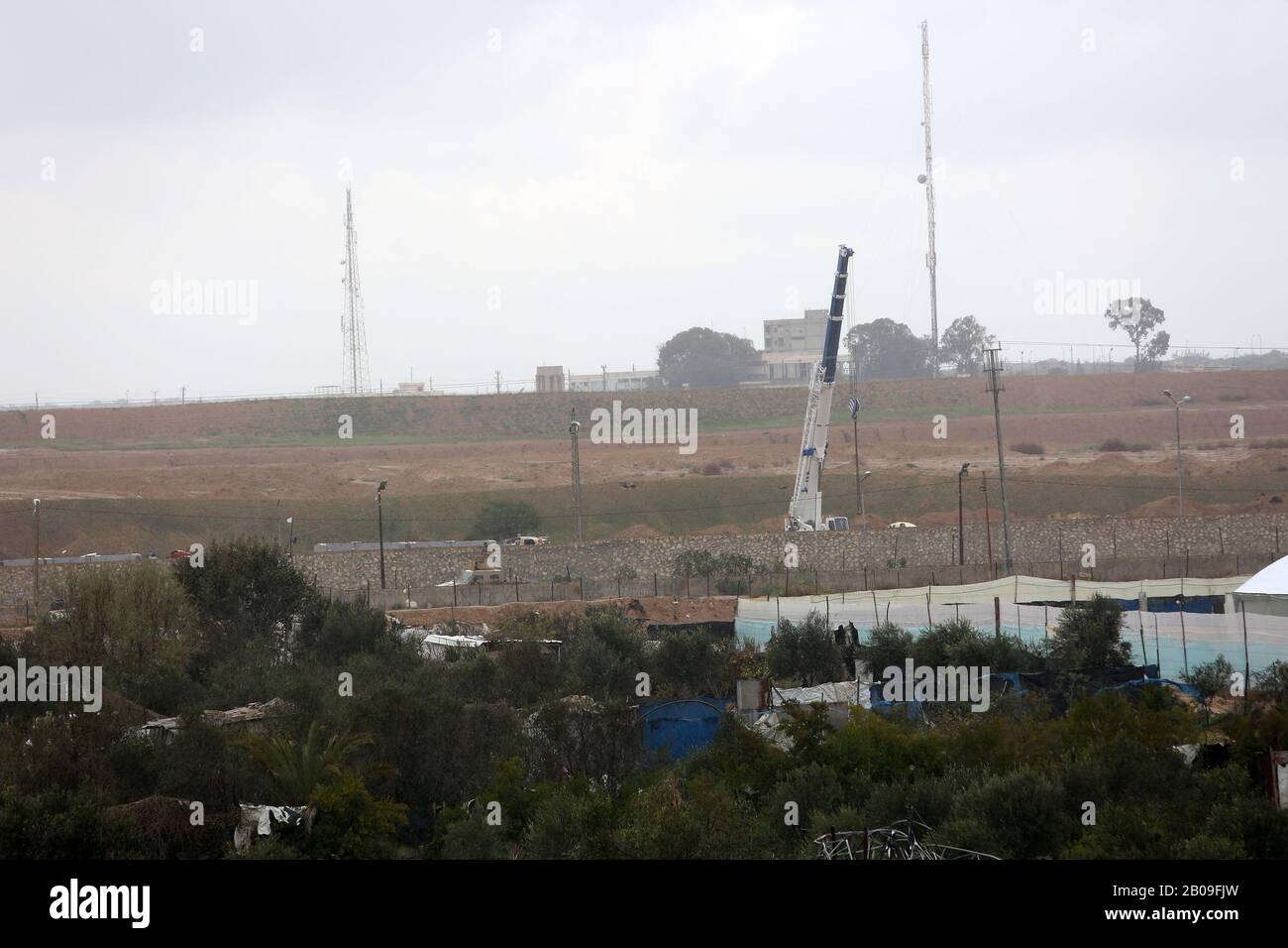 A picture taken in Gaza Strip at the border with Egypt shows the construction site of a wall on the Egyptian side of the border on Feb 19, 2020. Stock Photo