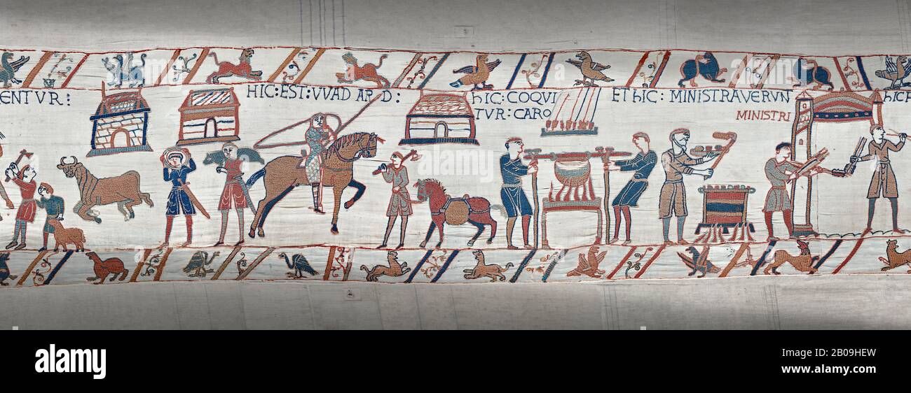 Bayeux Tapestry scene 41 - 42:  Cooks are supervised by Wadar, one of Williams servants. Stock Photo