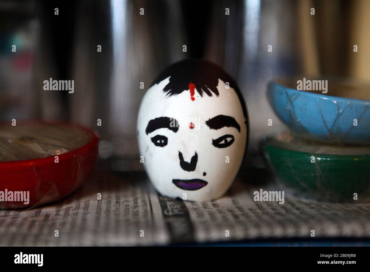A painted egg-shell on display. Dhaka, Bangladesh. September 13, 2010. Stock Photo