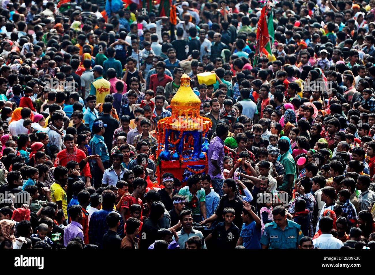 Thousands of Shia Muslims carryout a mourning procession of the holy Ashura on the 10th day of the holy month of Muharram. Ashura marks the martyrdom of Hazrat Imam Hassan and Hussain the grand sons of Prophet Muhammad, who were killed in a battle. Dhaka, Bangladesh. December 6, 2011. Stock Photo