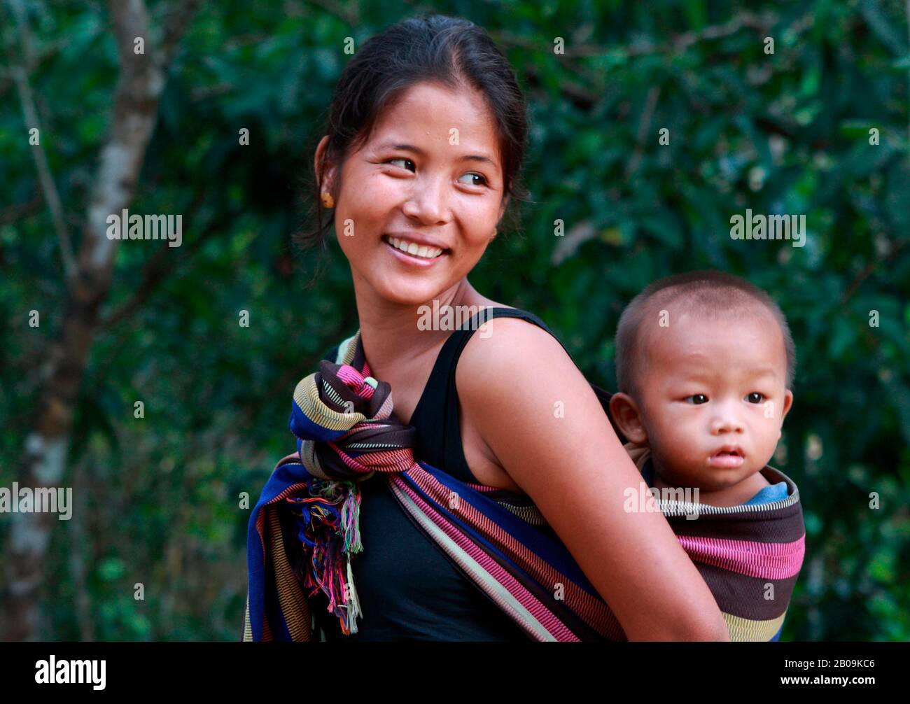 A woman from the Murong community with her child, in Bandarban, Bangladesh. September 26, 2009. Stock Photo