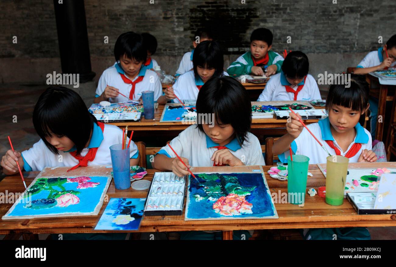 Children learn to paint at an art school in Guangzhou Province, China. September 17, 2009. Stock Photo