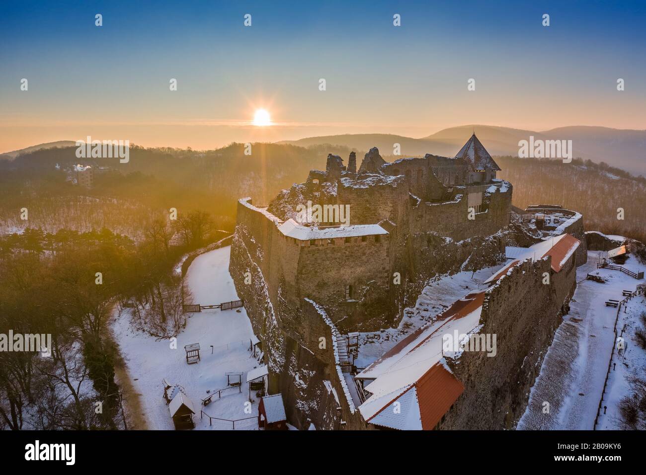 Visegrad, Hungary - The beautiful old high castle of Visegrad at sunrise on a winter morning with snow Stock Photo
