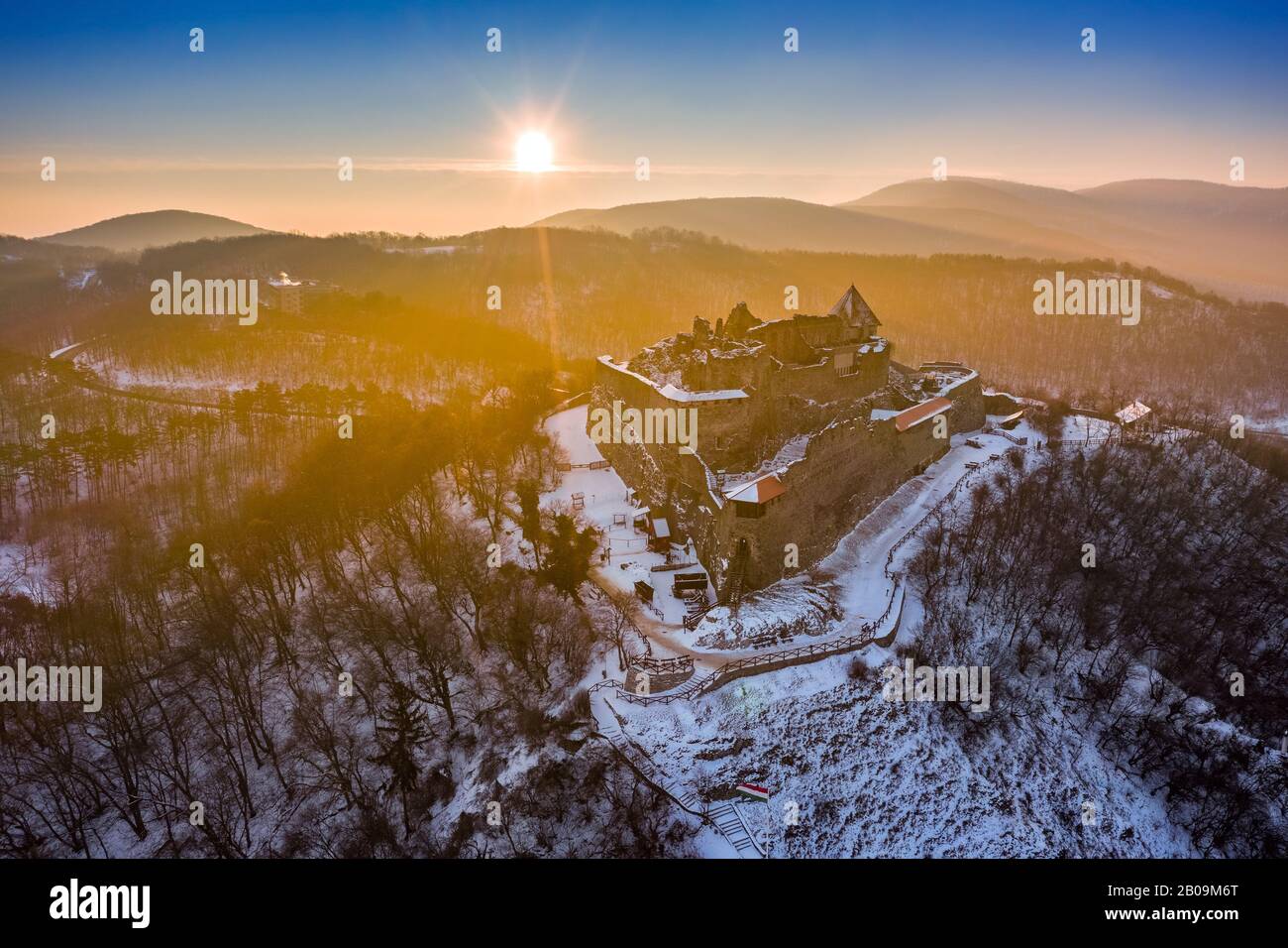 Visegrad, Hungary - Aerial view of the beautiful old high castle of Visegrad at sunrise on a winter morning with snow Stock Photo