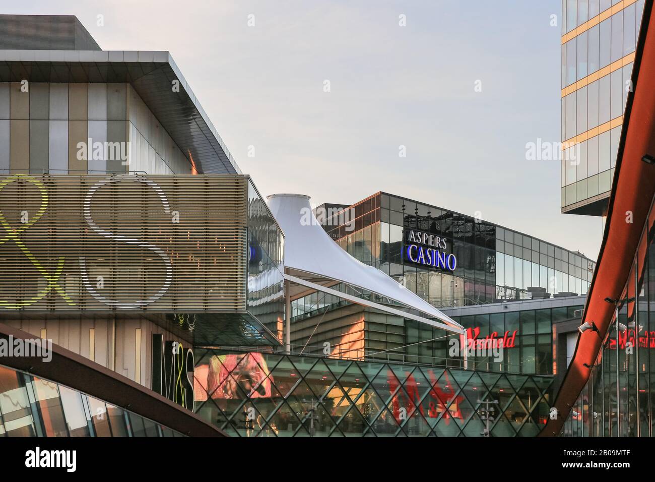 Retail brand logos, shops and shopping mall architecture at Westfield Stratford Shopping Centre, exterior, Stratford, London, UK Stock Photo