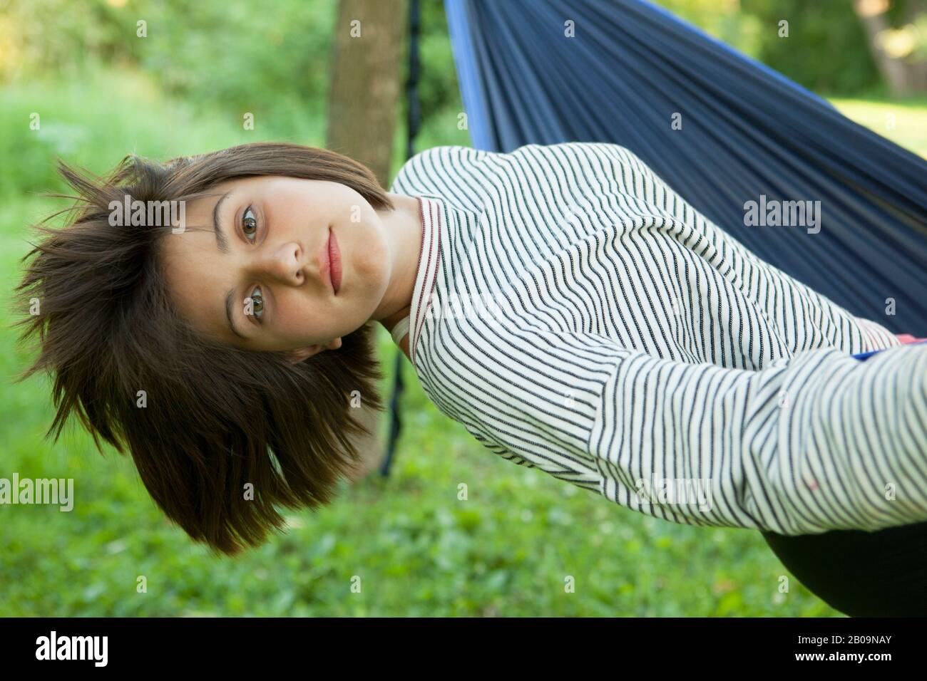 beautiful teen girl in hammock Stock Photo