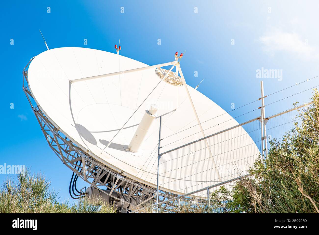 satellite antenna for receiving and transmitting information in electromagnetic waves via satellites in orbit Stock Photo