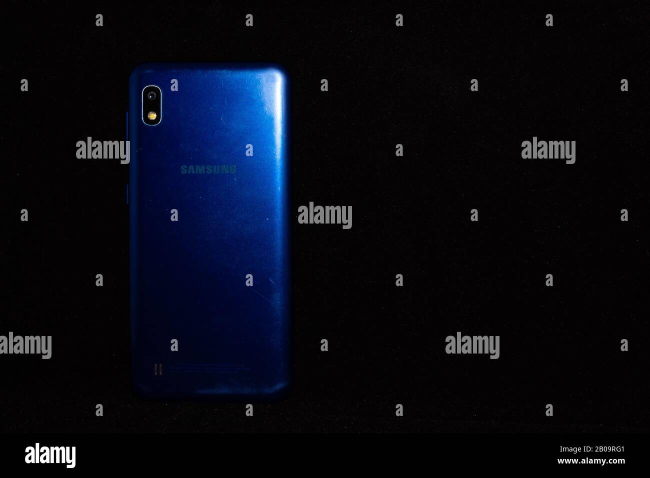 Culiacan, Sinaloa, Mexico - January 20 2019: Blue cell phone of Korean brand with black background Stock Photo
