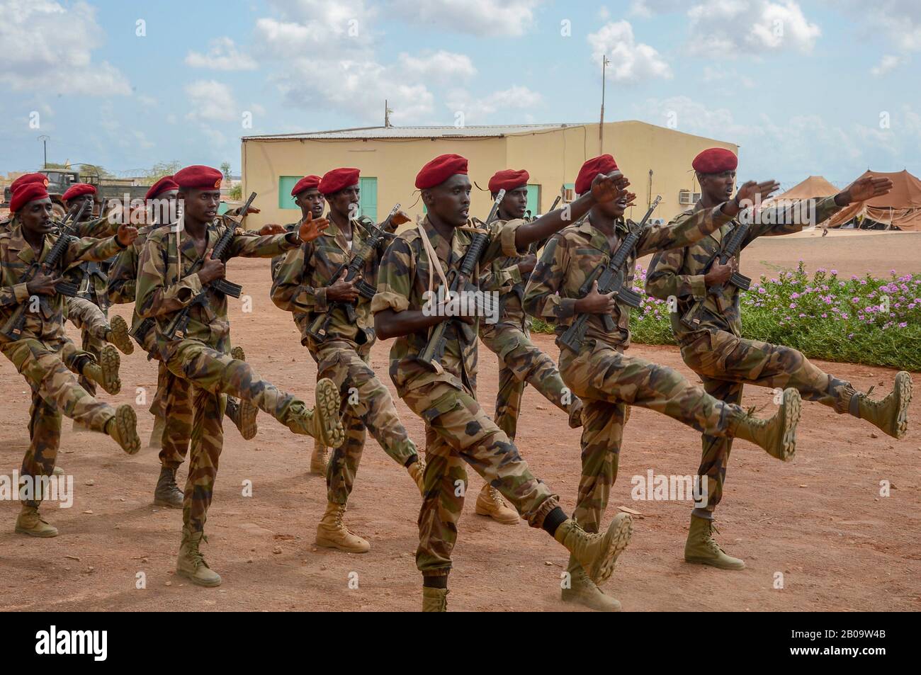 Djiboutian soldiers march in formation following the culminating exercise of a five-week training cycle for the newly formed Rapid Intervention Battalion May 3, 2018 near Djibouti City, Djibouti. U.S. service members are working closely with the Djiboutian Army to create a Rapid Intervention Battalion. Stock Photo