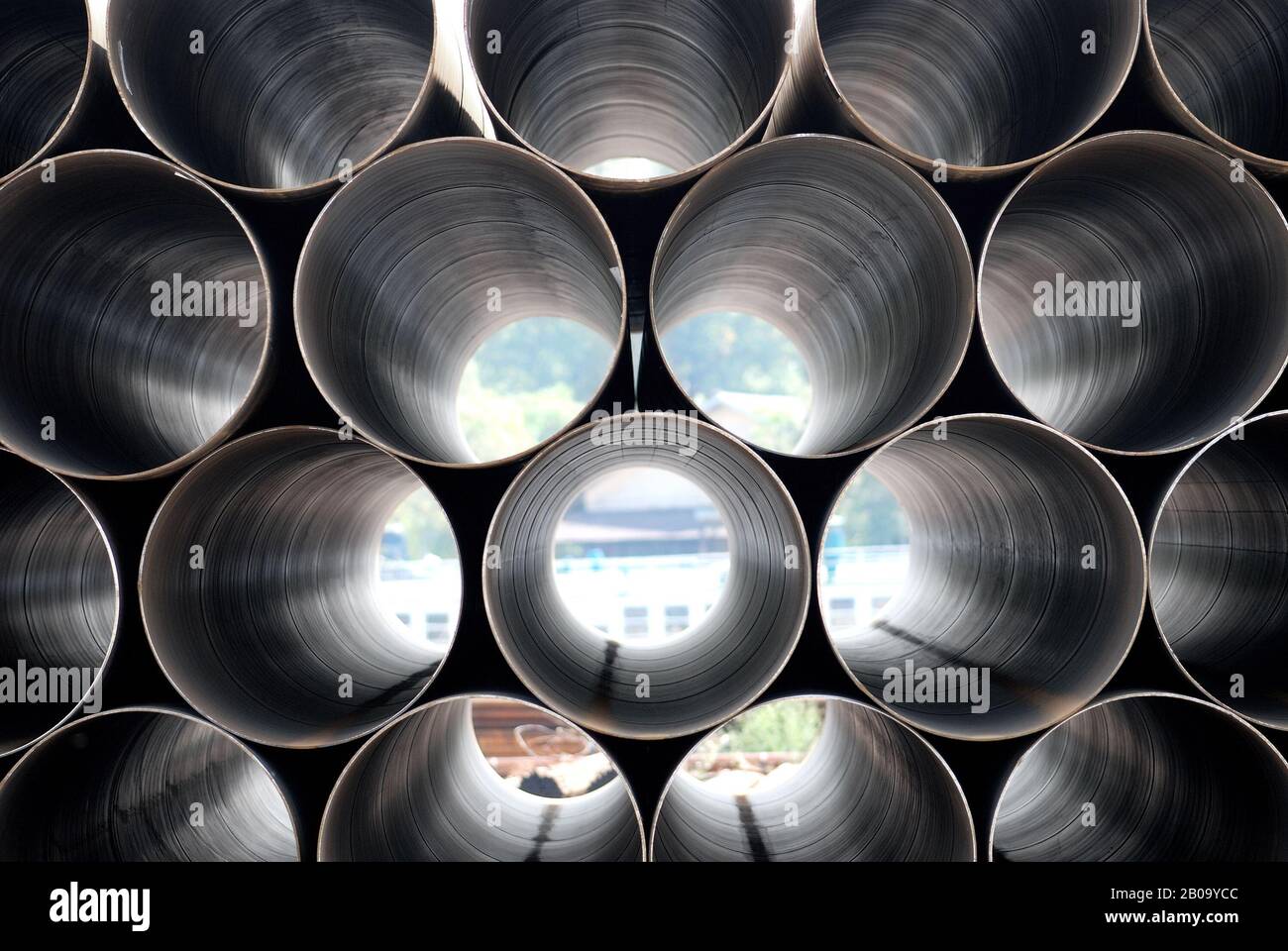 Stack of iron pipes. Industrial material Stock Photo - Alamy