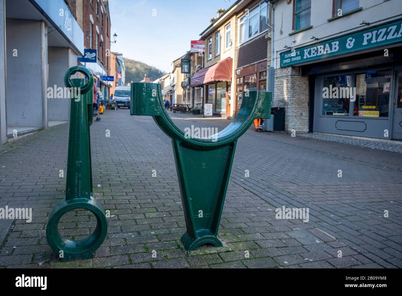 Street furniture in Dursley Gloucestershire is of larger than life castings of engine parts as made by the Lister Engine company in the town. Stock Photo