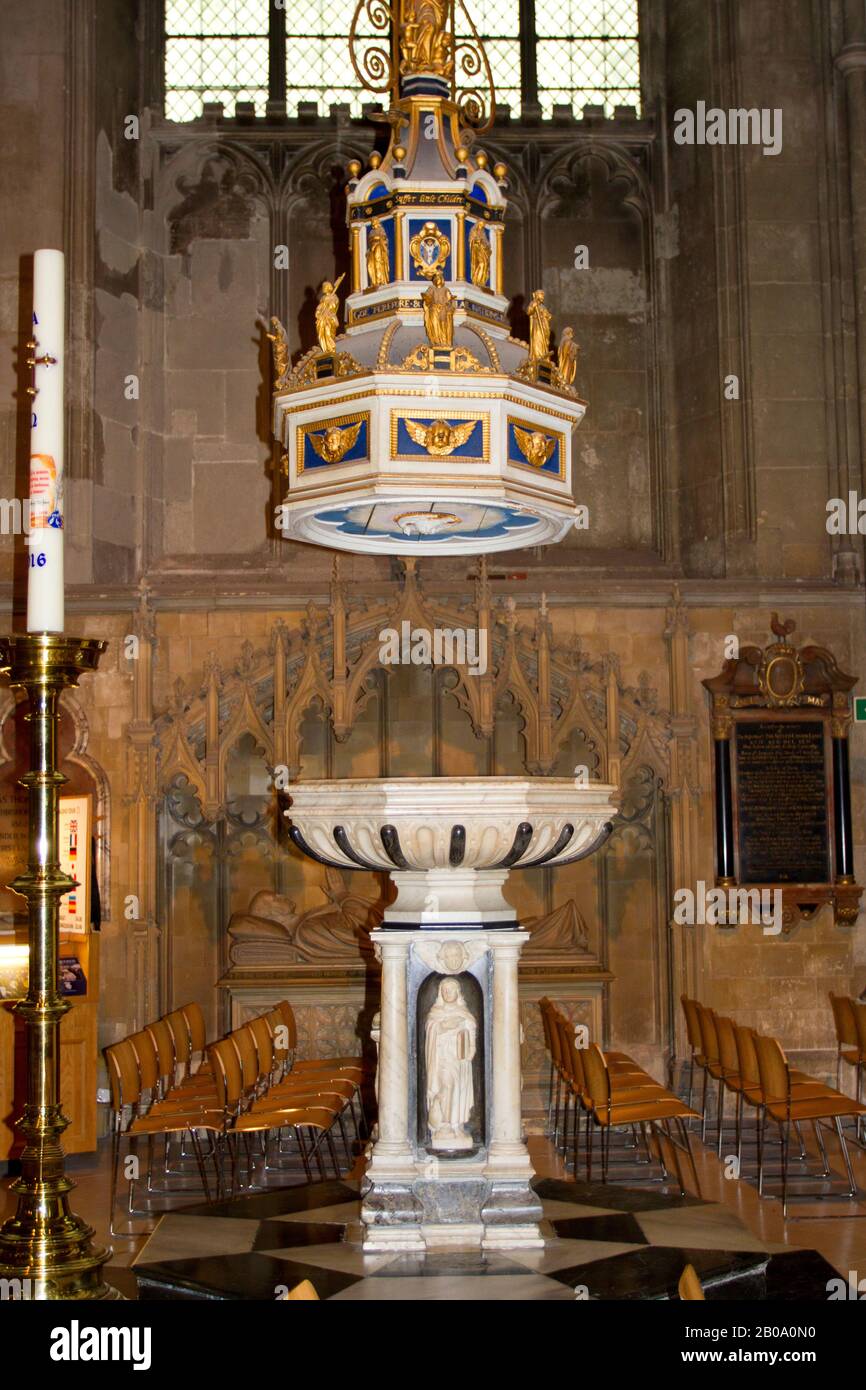The Baptismal Font located on the north aisle of the nave at Canterbury Cathedral in Canterbury, Kent, England Stock Photo