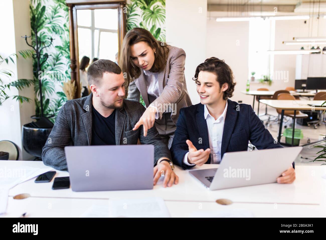 Businessteam working together on project Stock Photo