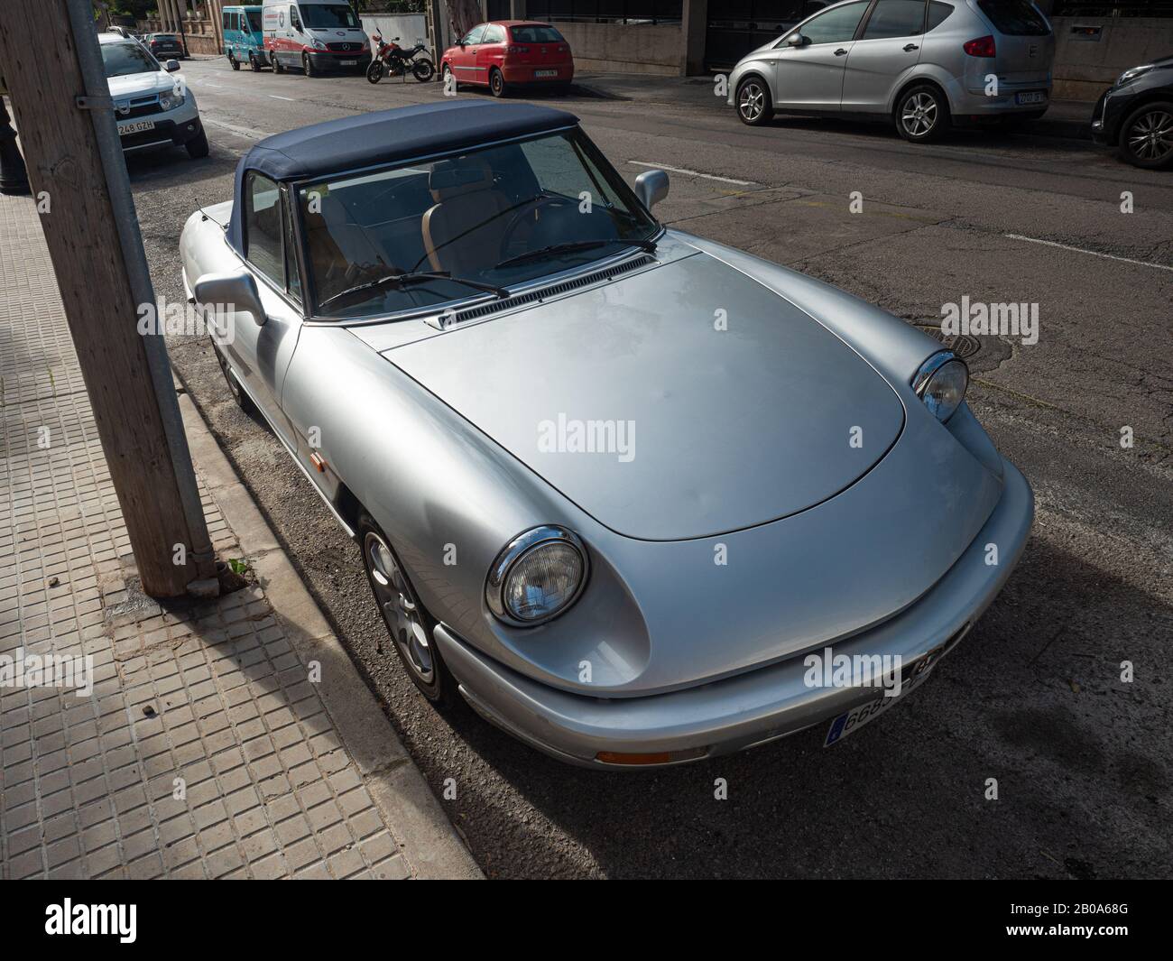 Silver car Alfa Romeo Spider Veloce, amazing cabriolet park in old town of  Palma de Mallorca, Spain 29th of January 2020 Stock Photo - Alamy