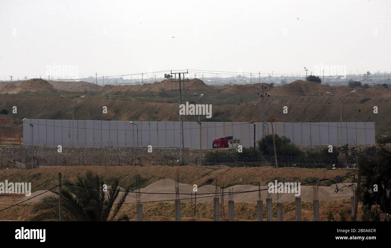 A picture taken in Rafah in the southern Gaza Strip at the border with Egypt shows a concrete wall under construction on the Egyptian side of the border on Wednesday, on February 19, 2020. Egypt has begun building a concrete wall along its border with Gaza, security source said. the Rafah crossing with Egypt, the only gateway out of Gaza that does not lead into Israel. The wall is being built along the lines of an old, lower barrier that includes an underground structure designed to curb smuggling tunnels between Gaza and Egypt. Photo by Ismael Mohamad/UPI Stock Photo