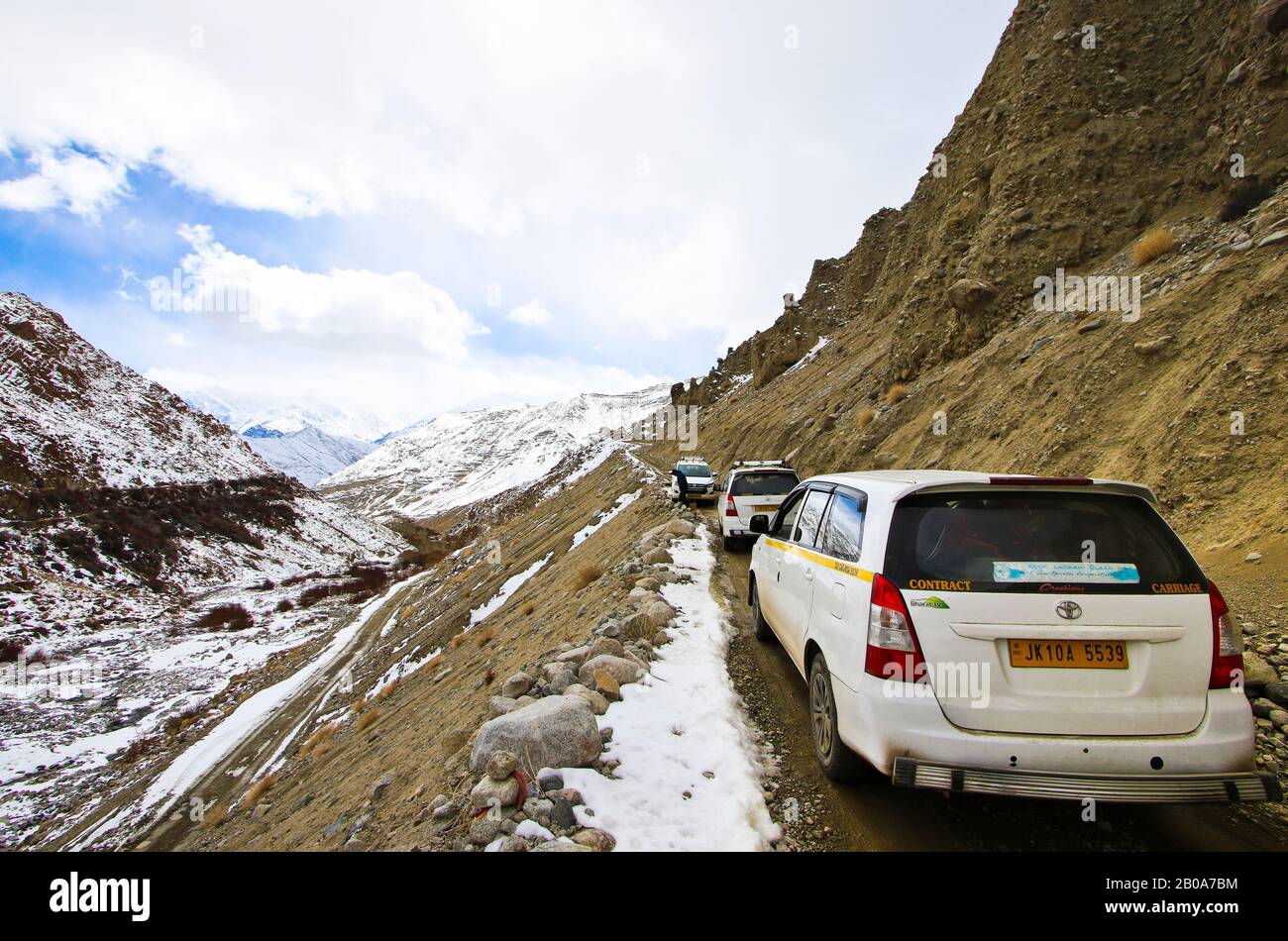 Tourist expedition searching snow leopard in Ulley valley. Ladakh ...