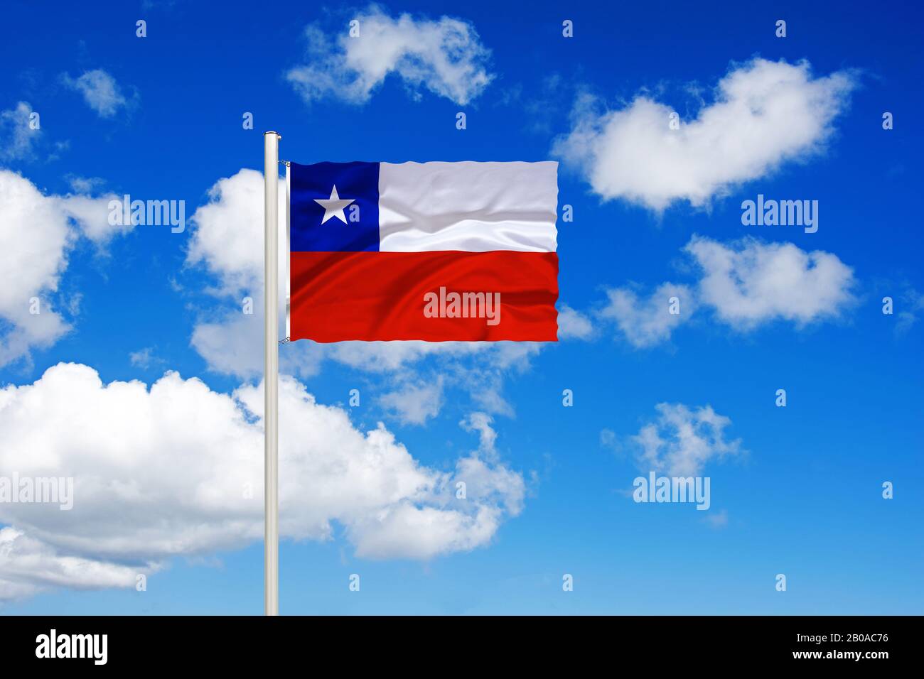 flag of Chile in front of blue cloudy sky, Chile Stock Photo