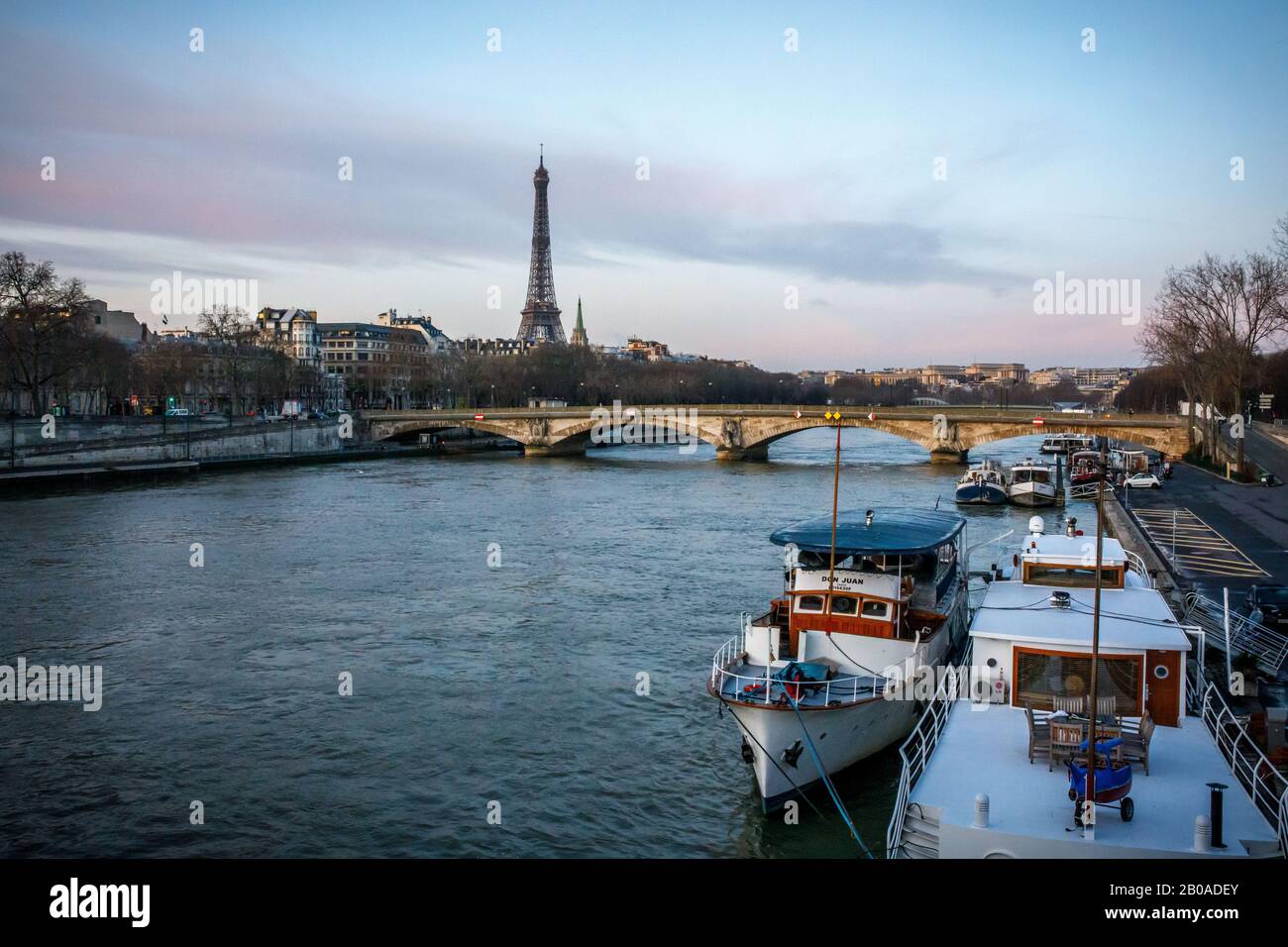Bateaux mouches boats on the Seine near the Eiffel Tower in Paris. Stock Photo
