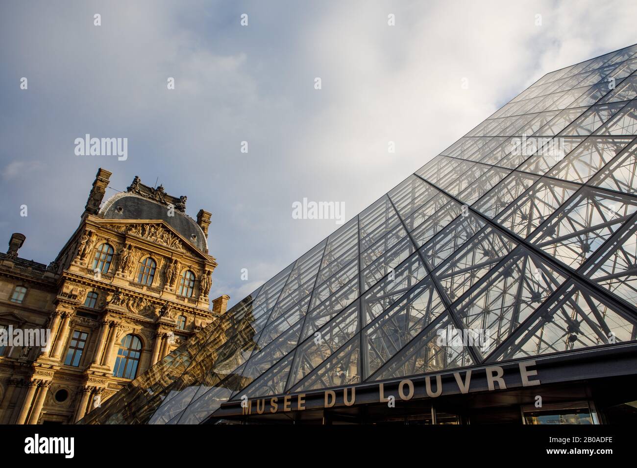 The famous glass pyramids at the entrance to the Louvre in Paris. Stock Photo