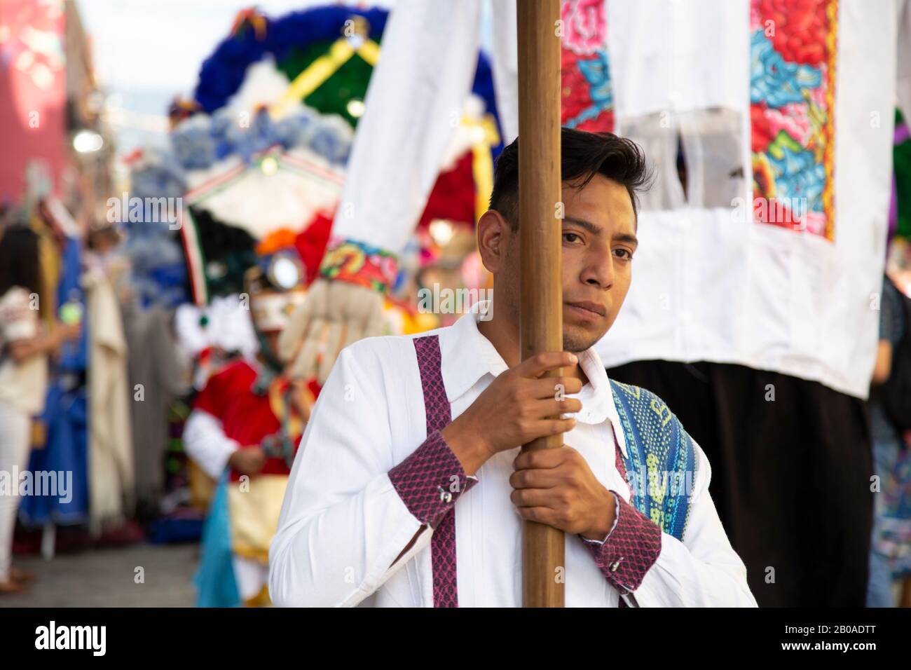 Mexican male, wearing traditional costume, at colorful Calenda Stock Photo