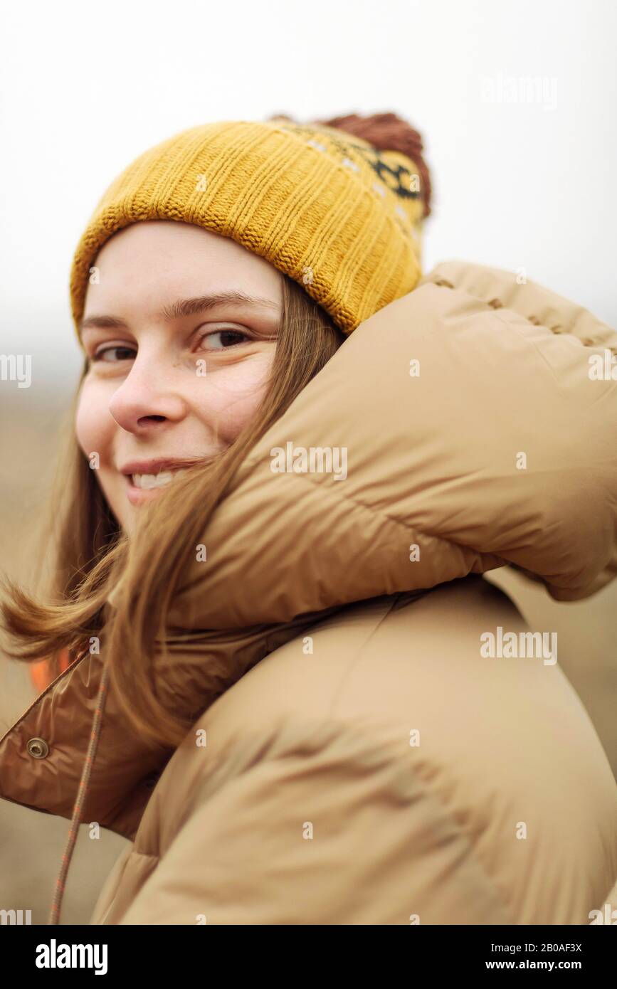 Woman smiling outdoors hi-res stock photography and images - Alamy