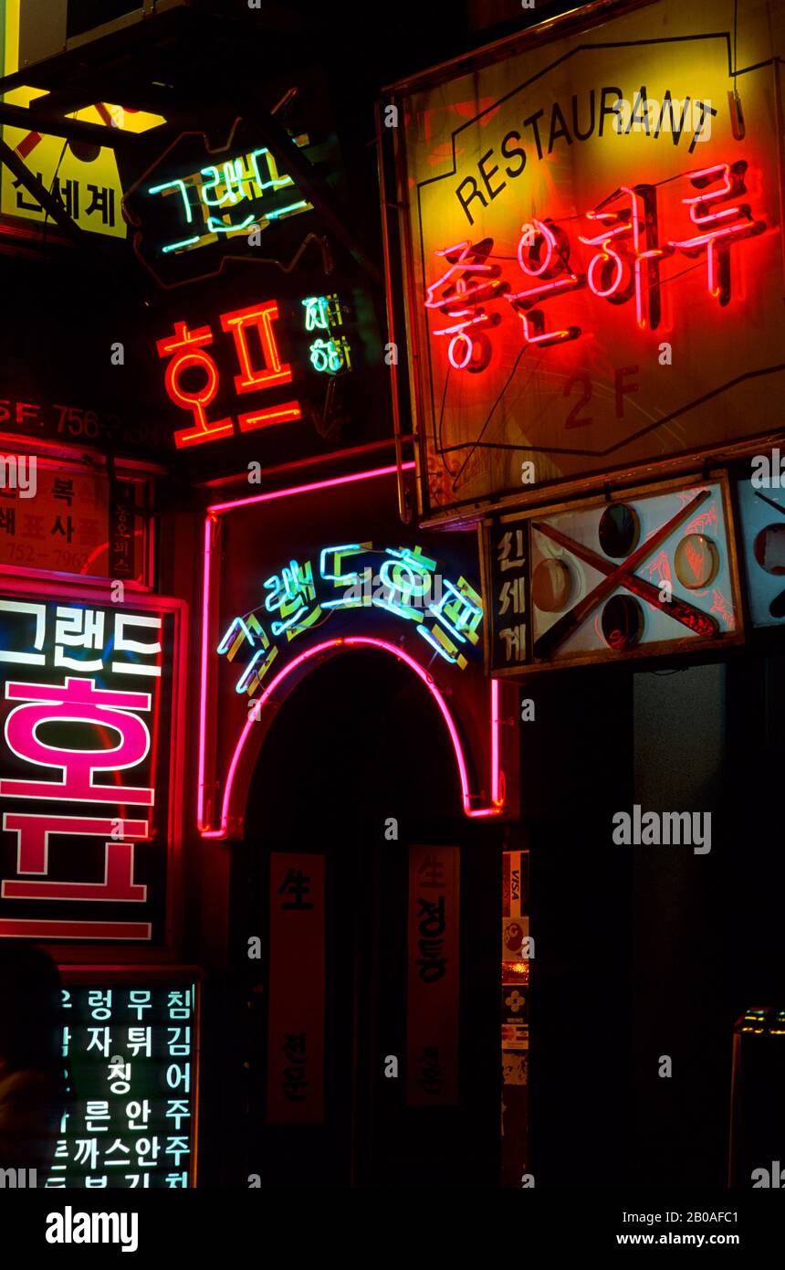 KOREA SEOUL MYUNG DONG SHOPPING AREA AT NIGHT WITH COLORFUL NEON   Korea Seoul Myung Dong Shopping Area At Night With Colorful Neon Signs 2B0AFC1 