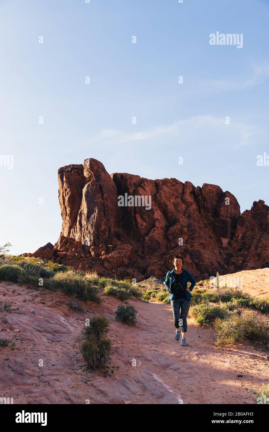 Woman in desert landscape hi-res stock photography and images - Alamy
