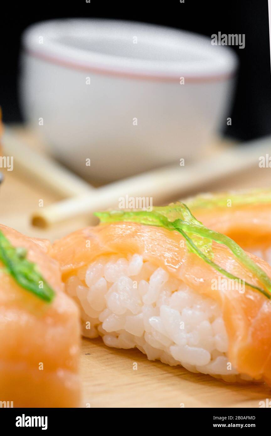 Japanese restaurant food. assorted sushi rolls on black isolated background .  Stock Photo