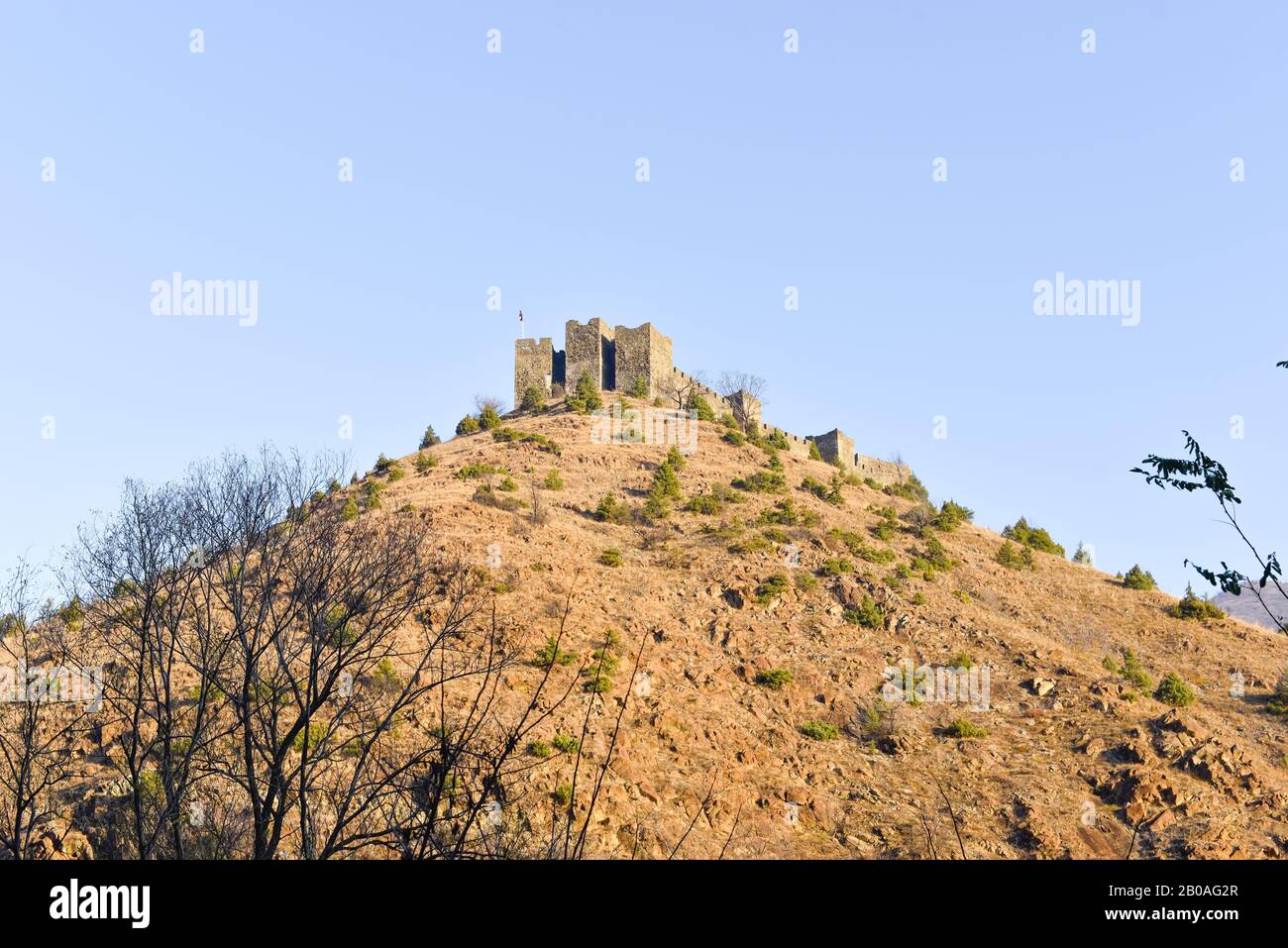 Brighter image of Maglic castle standing on top of the hill near Kraljevo in Serbia during the sunny autumn day Stock Photo