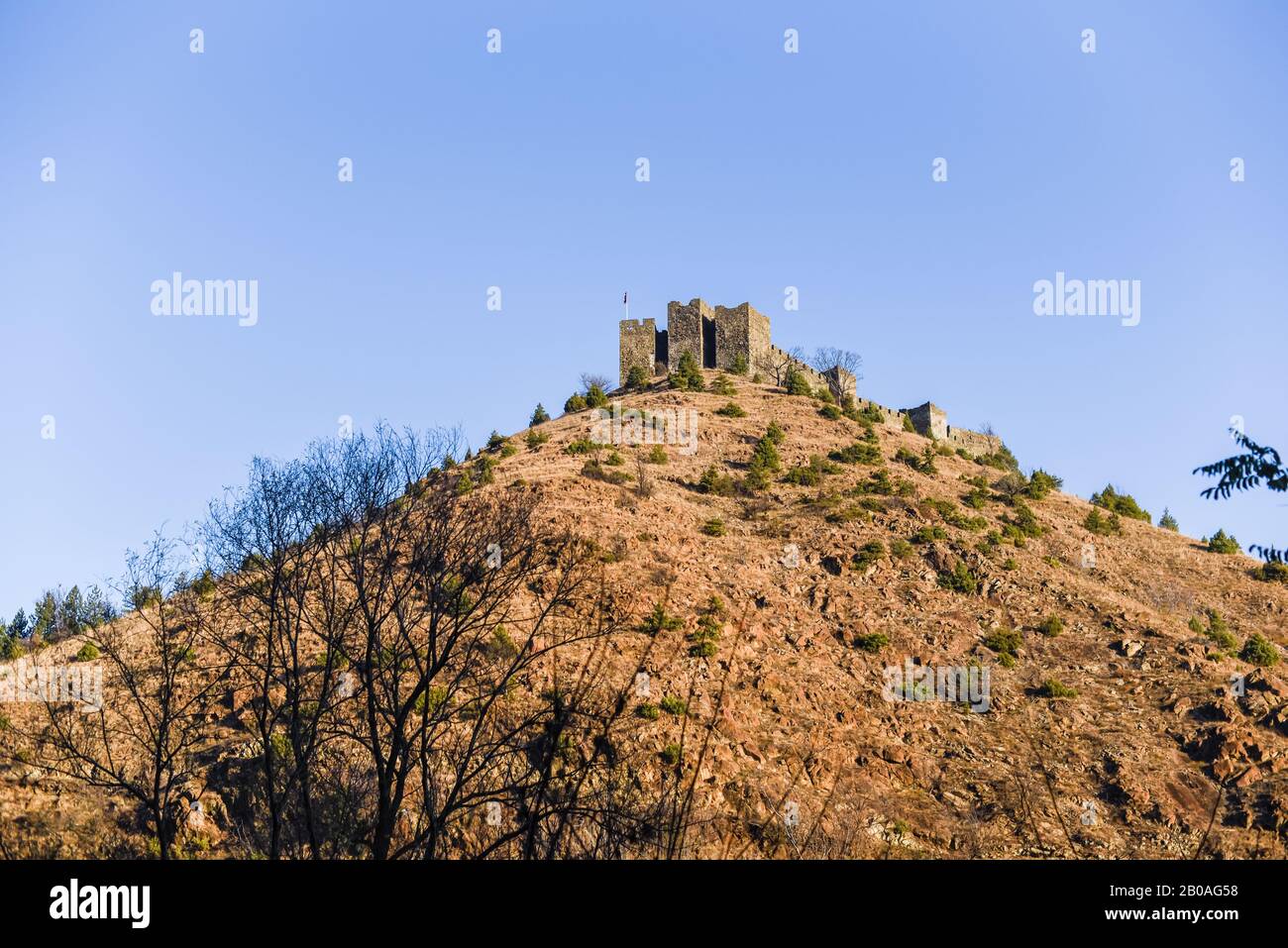 Maglic castle standing on top of the hill near Kraljevo in Serbia during the sunny autumn day Stock Photo