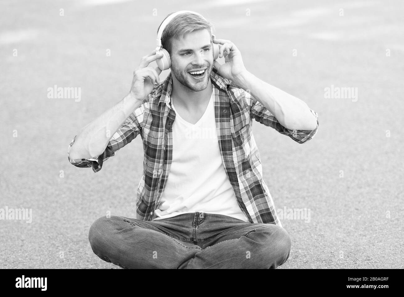 Worldwide knowledge access. Audio library. Another way of learning. Man handsome college student headphones. Online learning. Educational technology. E learning. Study anywhere. Audio book concept. Stock Photo