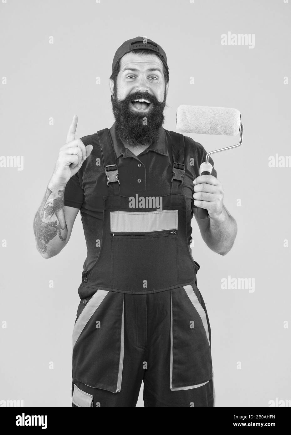 creative idea. inspired engineer designer ready to paint wall. repair