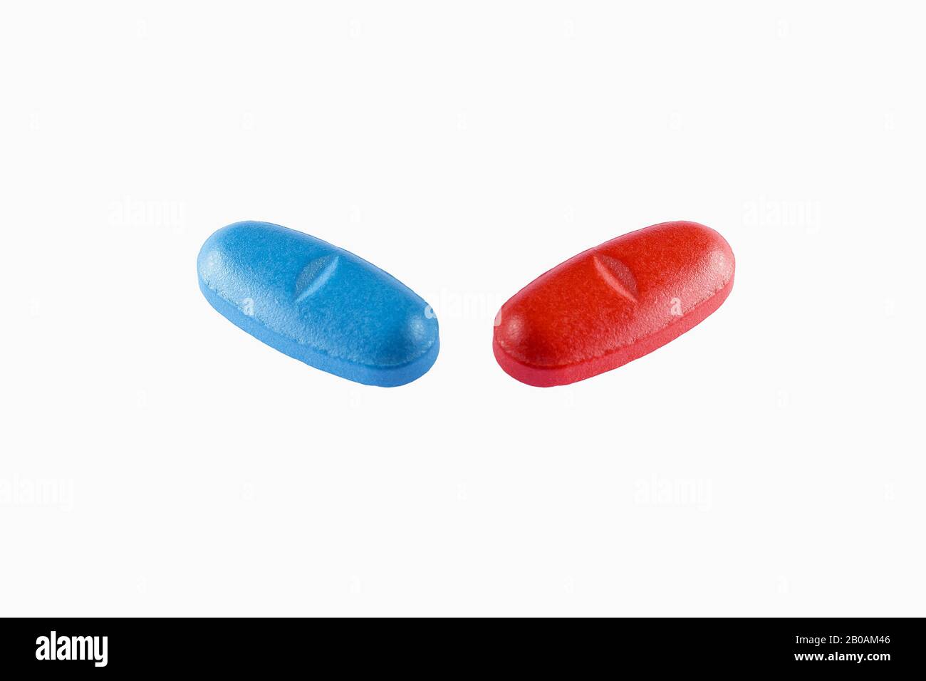 View of a blue and red Pills on White background Stock Photo