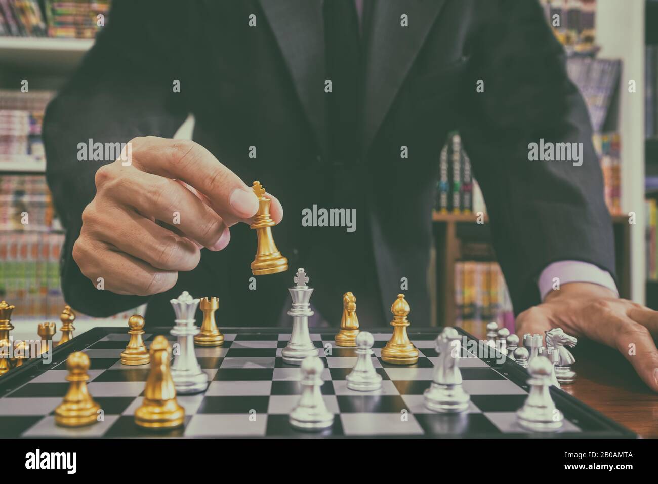 Businessman Playing Chess Board Game For Development Analysis New Strategy  Planningthe Battle Of Competition And Strategy Ideas With Market Mechanism  Stock Photo - Download Image Now - iStock