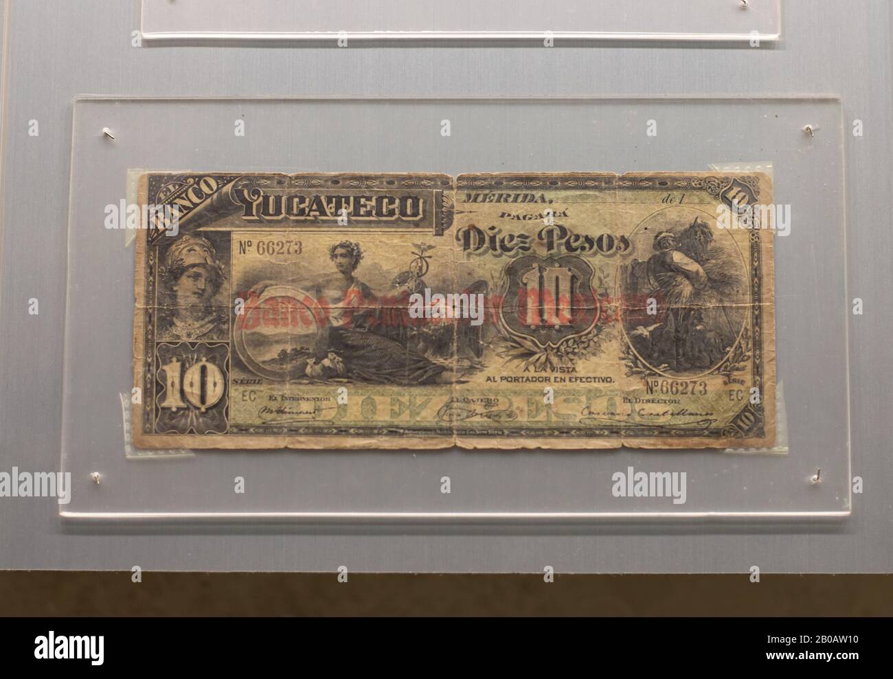Old Mexican bank notes, currency, money, from the Banco Peninsular Mexicano. Merida, Yucatan, Mexico. Stock Photo