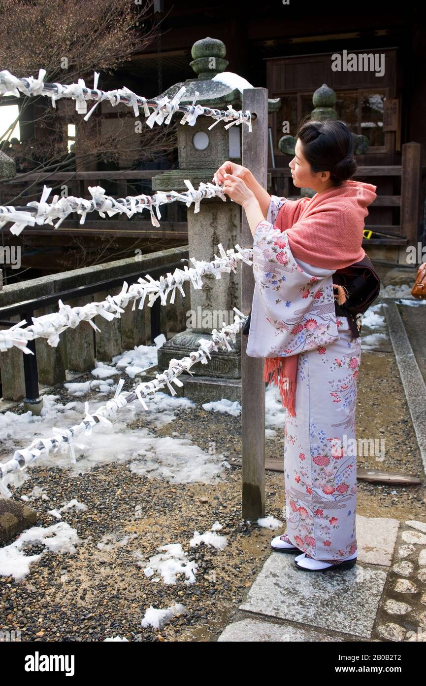 Japanese woman in winter clothing, Japan, c.1870's Stock Photo - Alamy