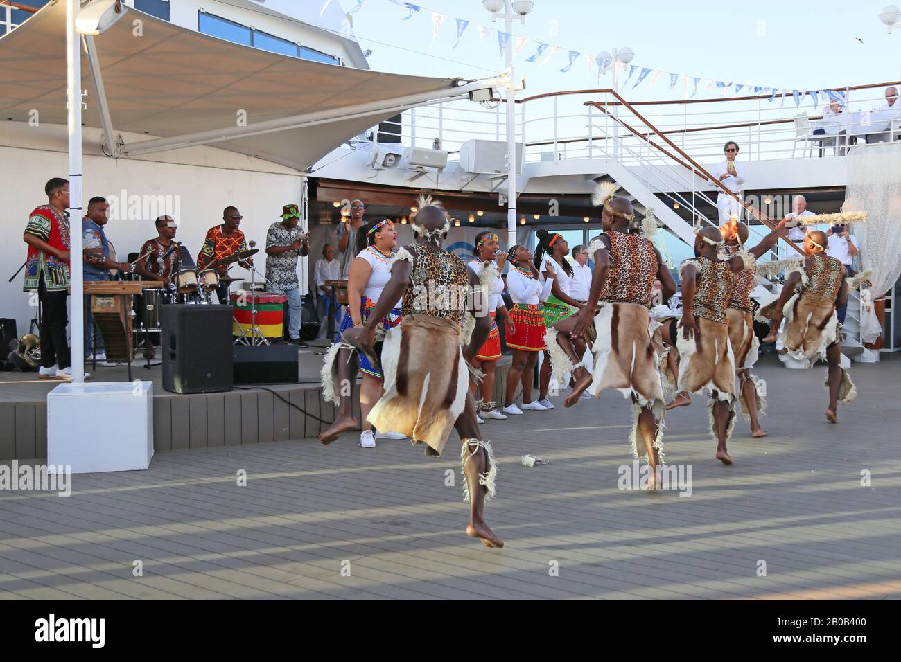 A Zulu cultural group perform for passengers on Azamara Quest cruise ship, Cape Town, Table Bay, Western Cape Province, South Africa, Africa Stock Photo