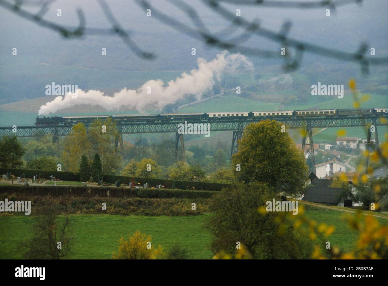 GERMANY, ORIENT EXPRESS TRAIN GOING OVER BRIDGE IN THE BLACK FOREST Stock Photo