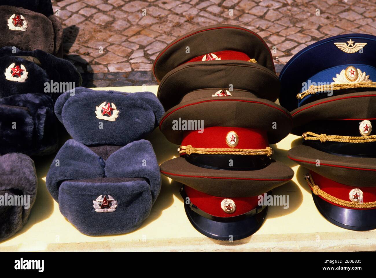 GERMANY, WEST BERLIN, SOUVENIR STAND WITH RUSSIAN ARMY HATS Stock Photo -  Alamy