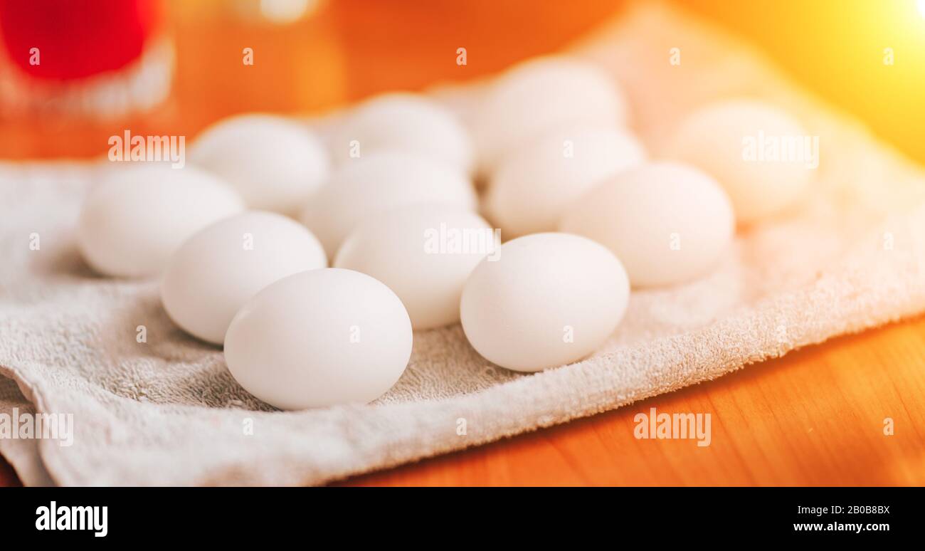 Many white eggs lying on napkin prepare for paint Stock Photo